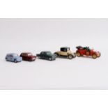 A collection of 5 unboxed Corgi Toys including 2 Minis, a 1910 Daimler with passengers, and two