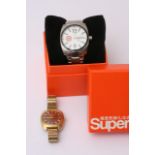 An Eternamatic wristwatch and a boxed Superdry watch (2).