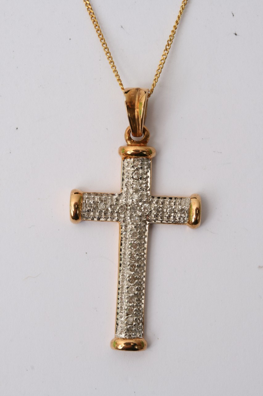 A 9ct gold necklace with a 9ct gold and diamond encrusted crucifix, approx 3.6g.