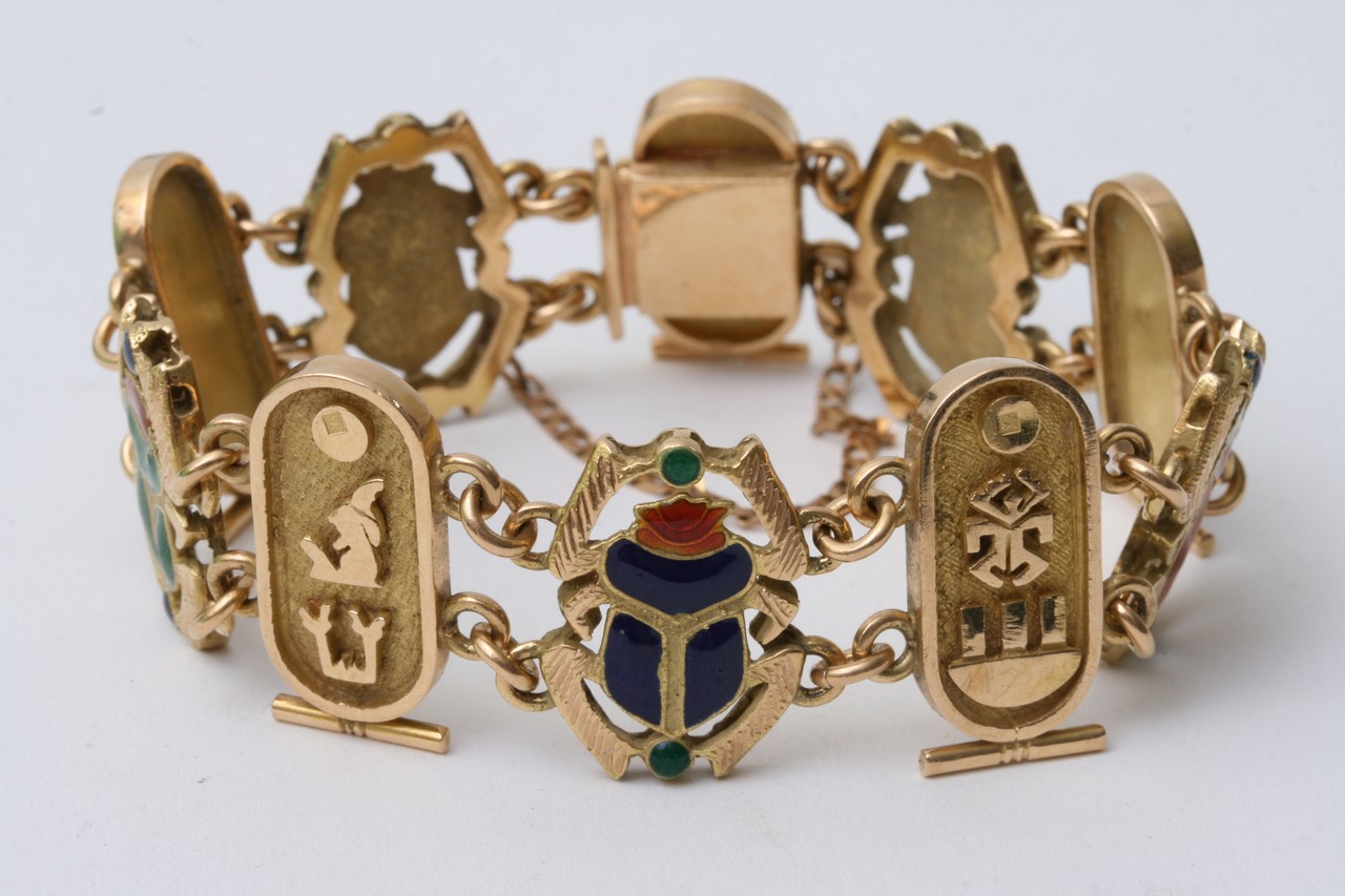 An 18ct gold and enamel bracelet with alternating