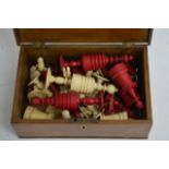 Mid XIX century turned and red stained bone chess