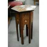 An inlaid Middle Eastern table, approx 34cm x 29.5cm x 52cm.