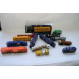 A boxed Corgi Boddingtons ERF curtain sider No75202 together with 13 unboxed Corgi container lorries