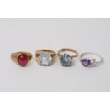 Four 9ct gold rings set with coloured stones