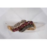 A 9ct Gold Ring with Seven Red Stones, Size N / O