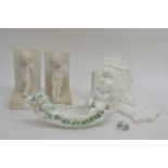 A Victorian white glazed wall shelf relief decorated with a Classical maiden, a pair of cherub