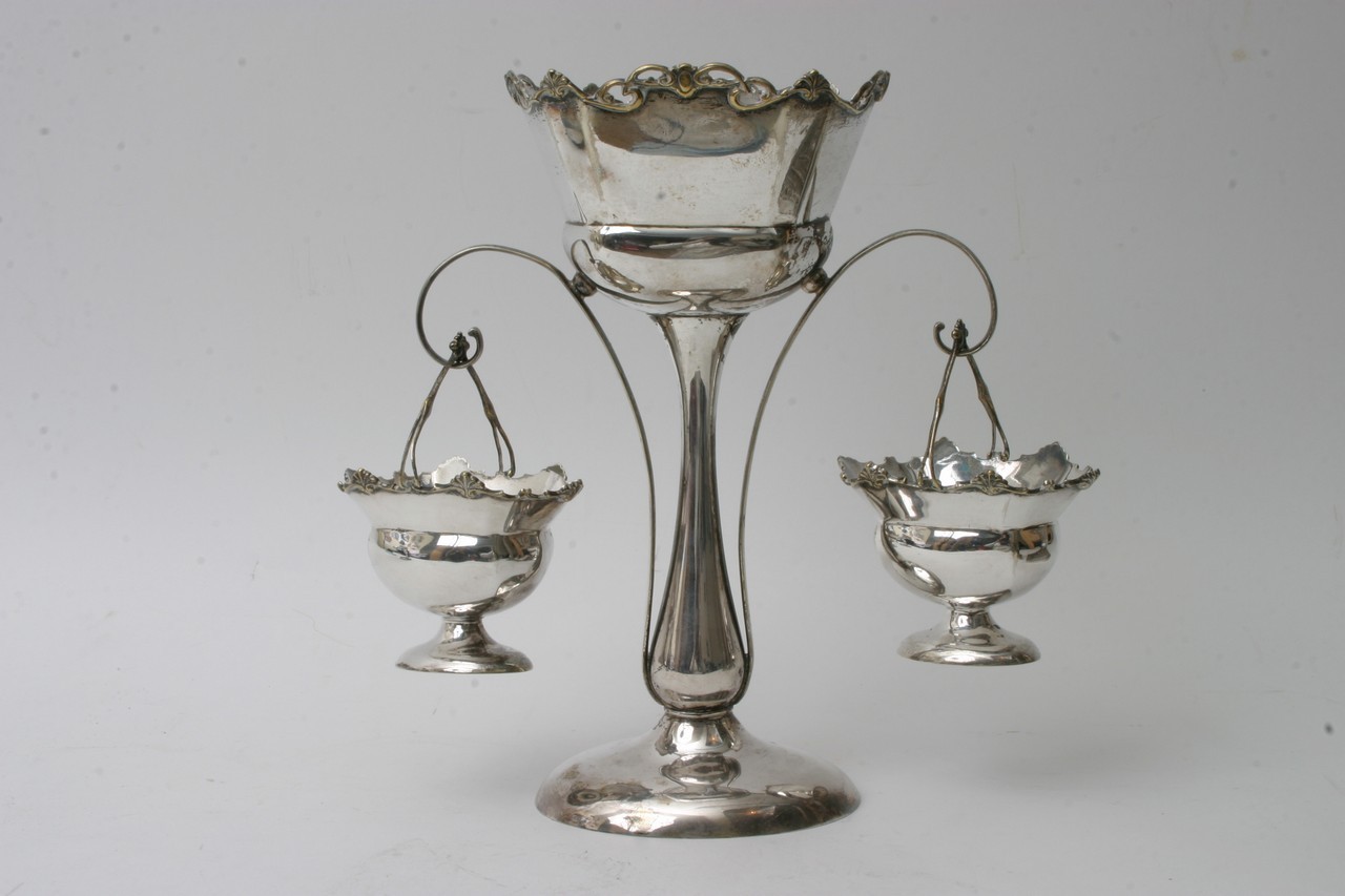 A silver plated epergne with twin handle baskets