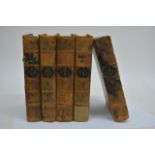 A set of five leather bound volumes 'Novels of Sir Walter Scott' published 1846.