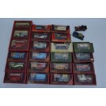 A box containing a collection of boxed matchbox models of yesteryear