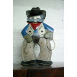 A metal night light in the form of a cowboy, approx height 40.5cm.