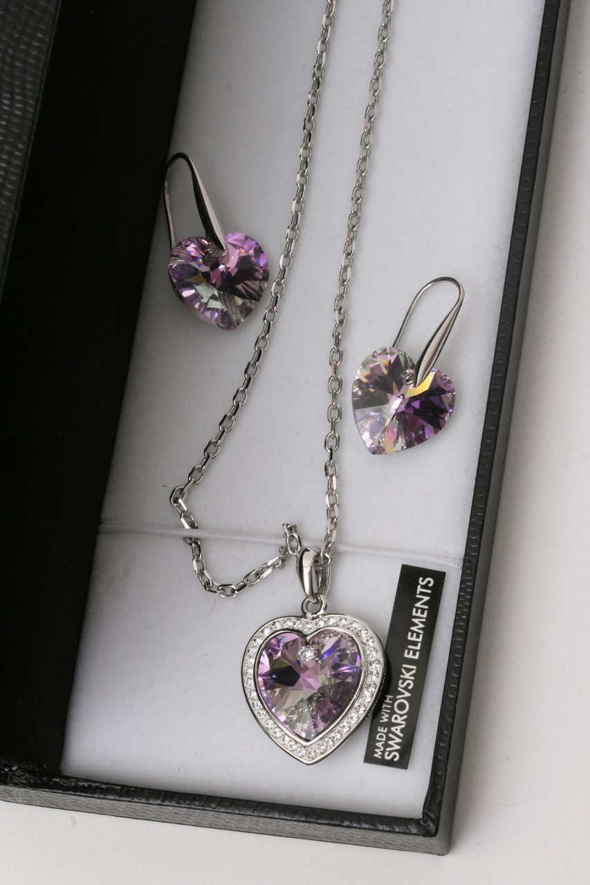 A Swarovski heart shaped pendant and matching earr