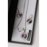 A Swarovski heart shaped pendant and matching earr