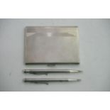 Two silver hallmarked yard-o-led pencils and a silver cigarette case (3)