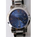 Gentlemen's working Burberry stainless steel watch in its original boxes with guarantee card and