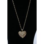 A 925 silver gilt QVC gold tone necklace with open heart pendant