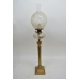 A Victorian Corinthian column oil lamp with clear cut glass reservoir, chimney and shade, approx