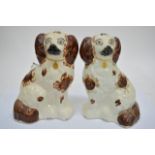 A pair of 20th Century Staffordshire type dogs