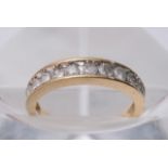 A 18ct Gold band Style Ring with inset Clear Stones, size J