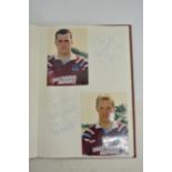 Two West Ham books comprising a dedicated book for matchday mascot John Pocklington, 1992 signed