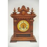 An Ansonia mantel clock with enamel chapter ring. Approx height 38cm.