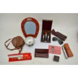 A boxed Coppertone watch, Asprey horseshoe shaped photo frame, vintage Rayban sunglasses, and