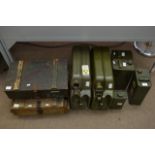 A collection of items including jerry cans, two wo