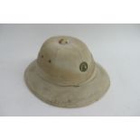 A Pith helmet fitted with a sand cast Long Range D