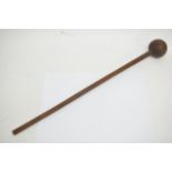 A wooden African knobkerrie hunting club