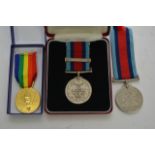 A Normandy campaign medal and three other medals