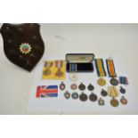 Three WW1 medals, a cased National Service medal a