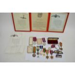 A collection of war medals including an Africa Sta