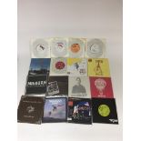 A collection of various 7 inch singles by contempo