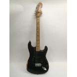 A 1974 Fender Stratocaster electric guitar in blac