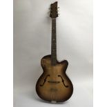 A vintage semi acoustic archtop guitar with f hole