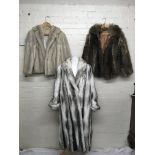 Two fur cropped jackets, a long Astraka two tone c