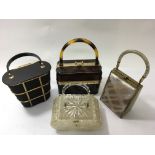 Four vintage Lucite box shape handbags