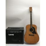 An Italian KD28 acoustic guitar and a Laney GC30 g