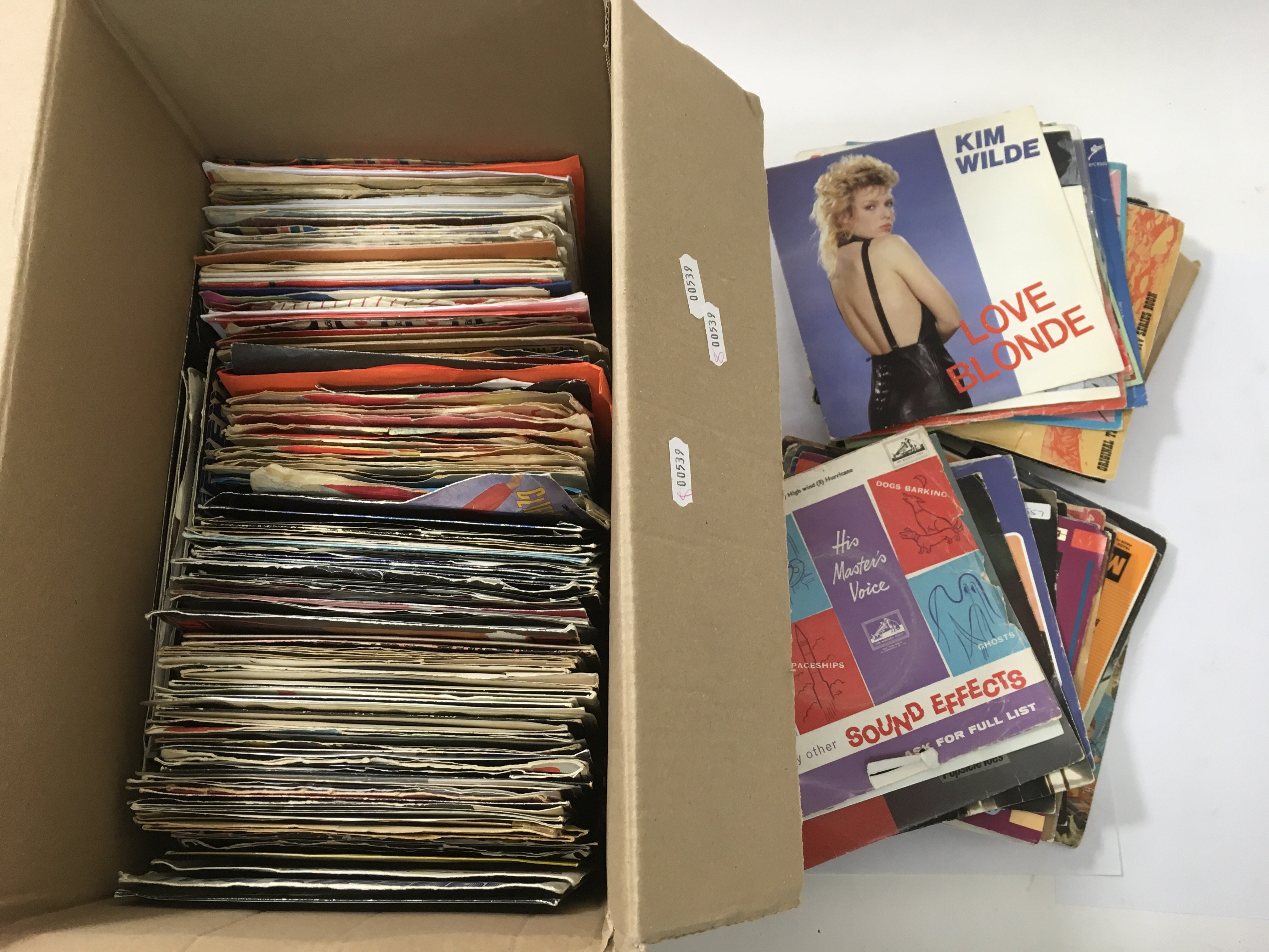 A collection of 7 inch singles by various artists