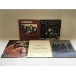 Five LPs comprising 'The Doors - LA Woman', 'Rolli