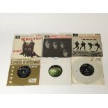 A collection of Beatles EPs and 7 inch singles plu