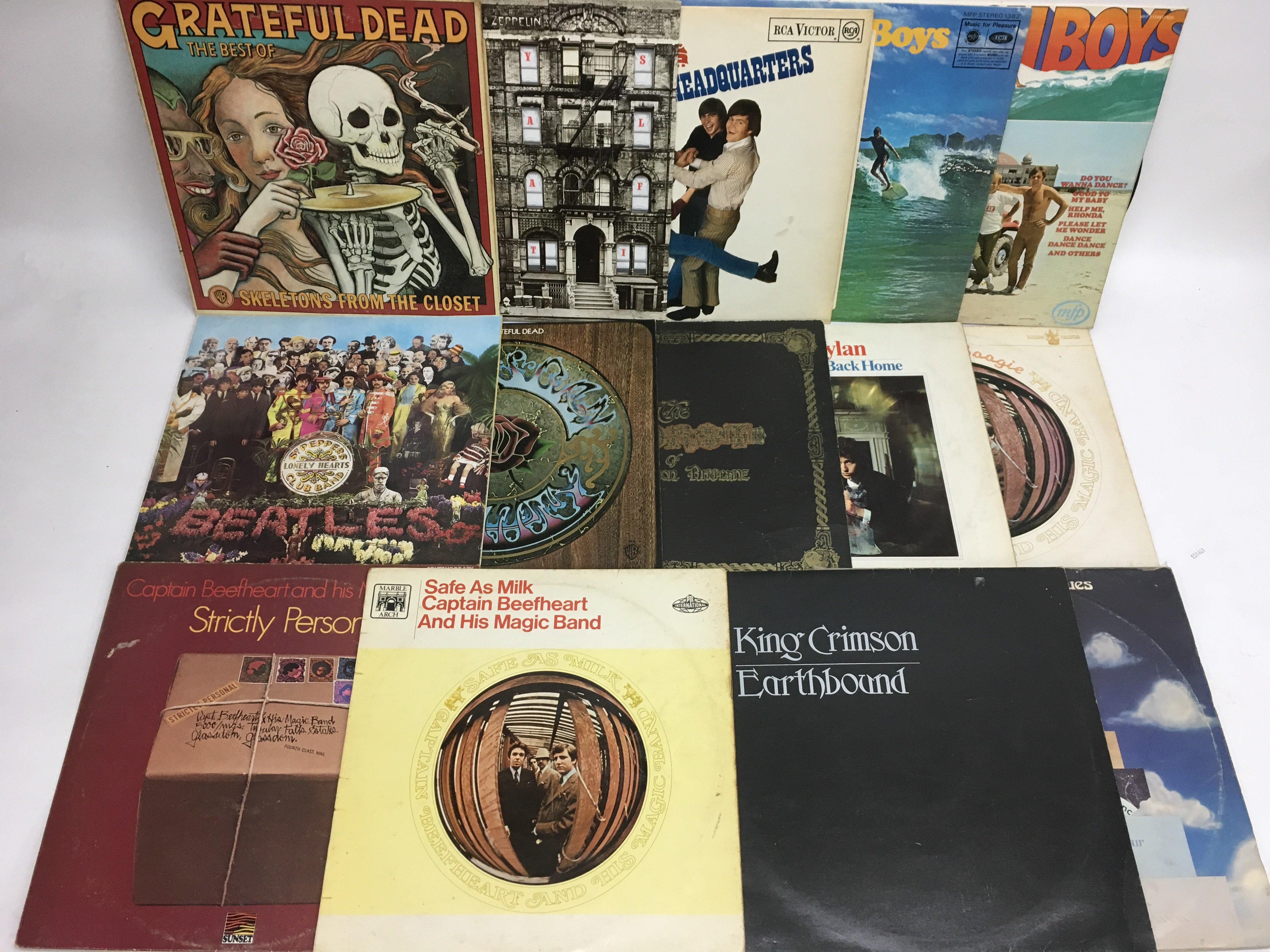 A collection of LPs by various artists including T