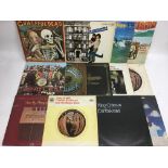 A collection of LPs by various artists including T