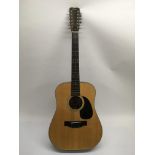 A Fender F-5-12 12 string acoustic guitar in fitte