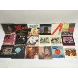 A collection of various 7 inch singles including S