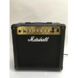 A Marshall MG15 DFX guitar amplifier.