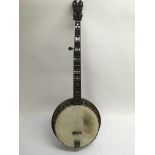 A John Grey & Son of London banjo.