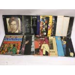 A collection of LPs by various artists including L