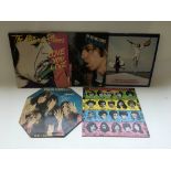 A collection of five Rolling Stones LPs including