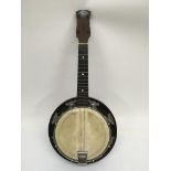 A John Grey & Sons of London banjolele in fitted c