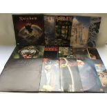 A collection of heavy rock and metal LPs by variou